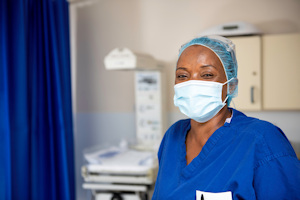 Midwife wearing a mask